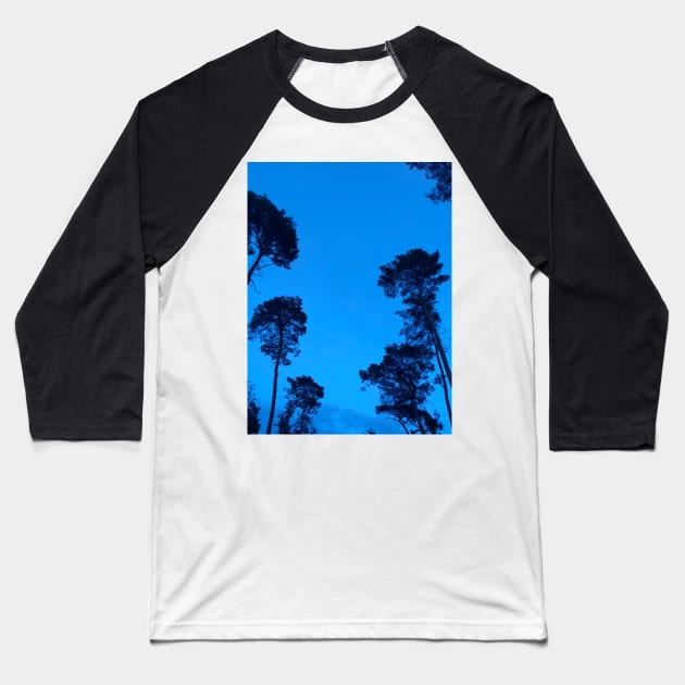 The trees are are watching us from a clear blue night sky Baseball T-Shirt by Artonmytee